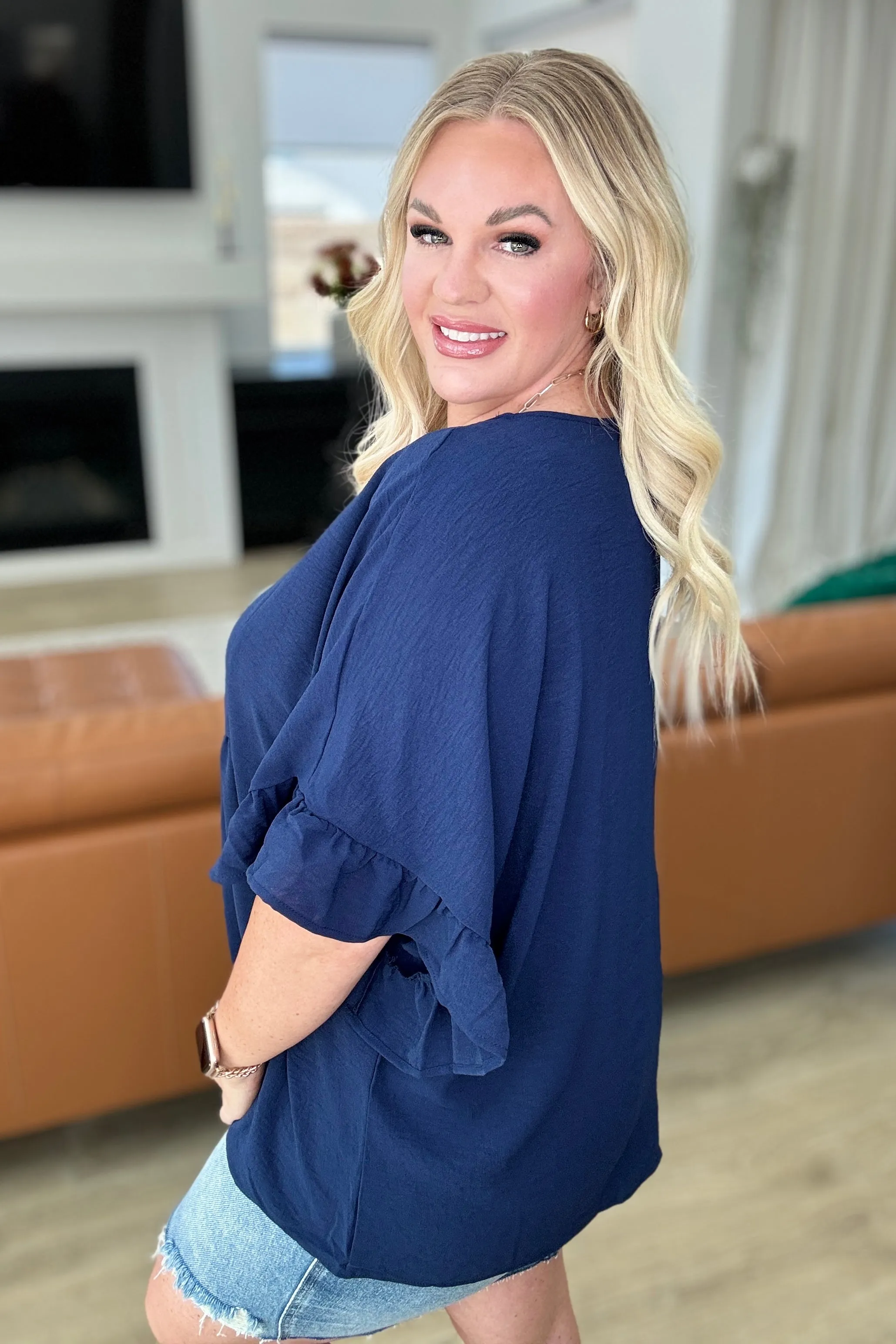 Navy Airflow Peplum Top with Ruffle Sleeves