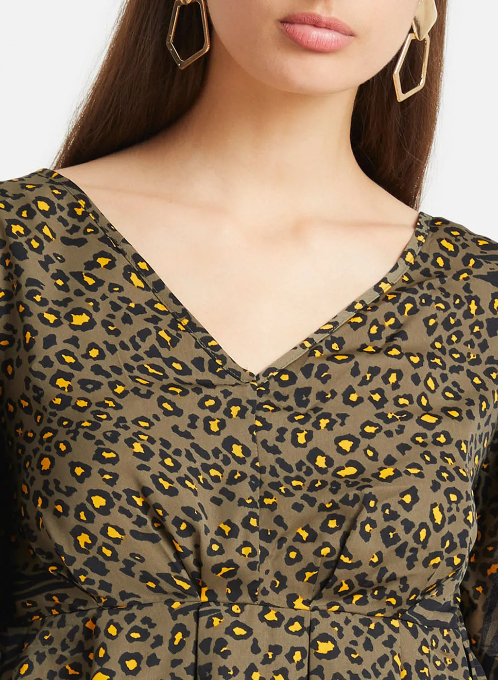 Leopard Print Cross Back Peplum Top